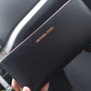 Brand New Michael Kors wallet/Travel hand bag